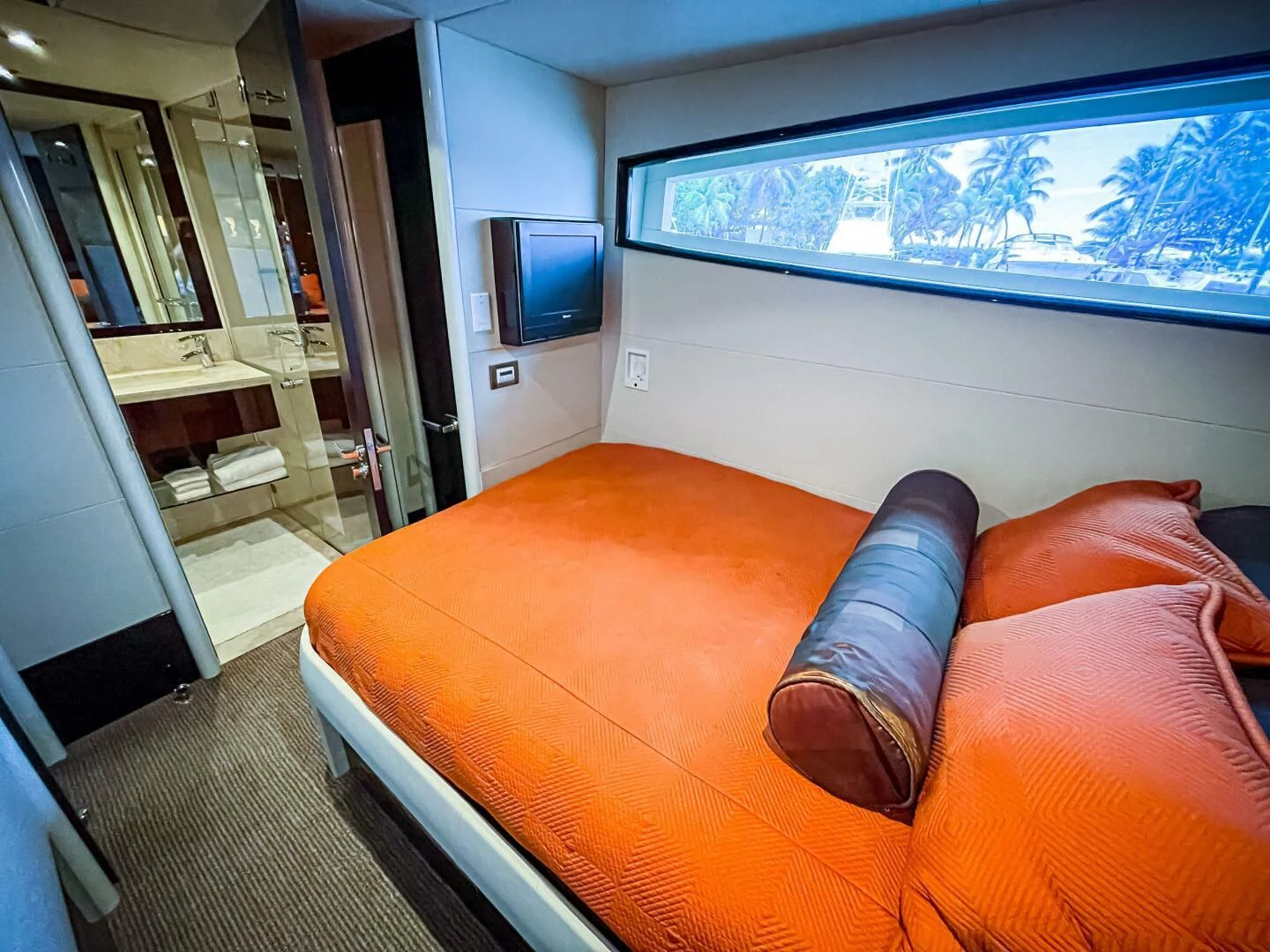 a living room with a couch and a tv aboard LOVIN LIFE Yacht for Sale