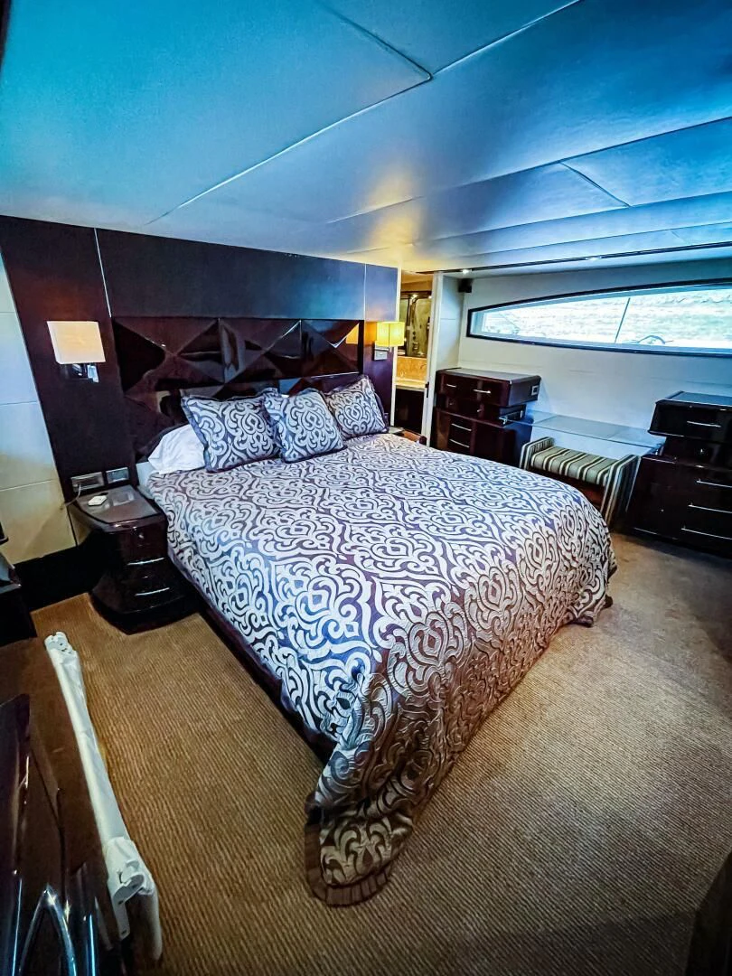 a bed in a room aboard LOVIN LIFE Yacht for Sale