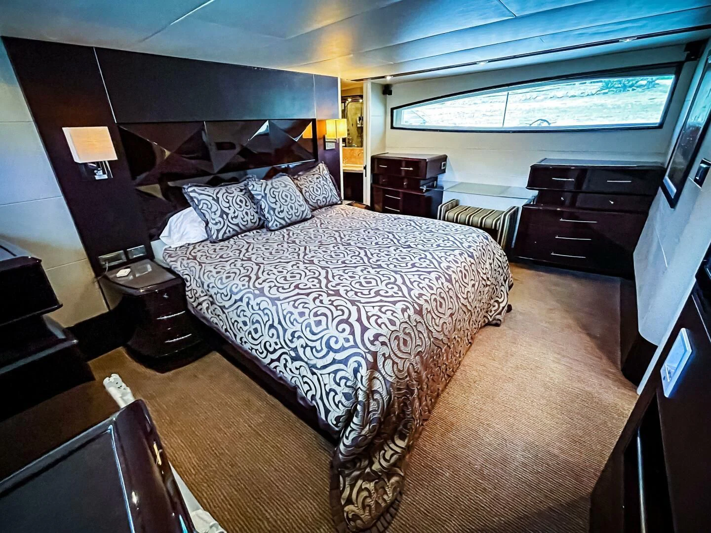 a large bedroom with a large bed aboard LOVIN LIFE Yacht for Sale