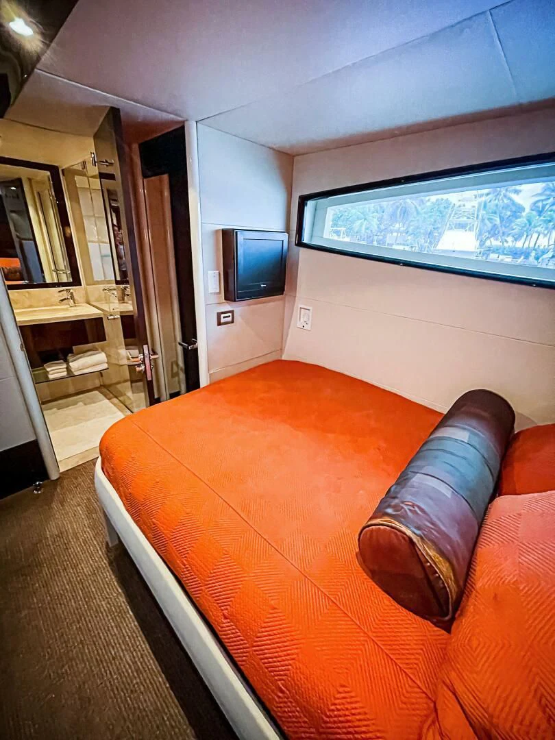 a living room with a couch and a tv aboard LOVIN LIFE Yacht for Sale