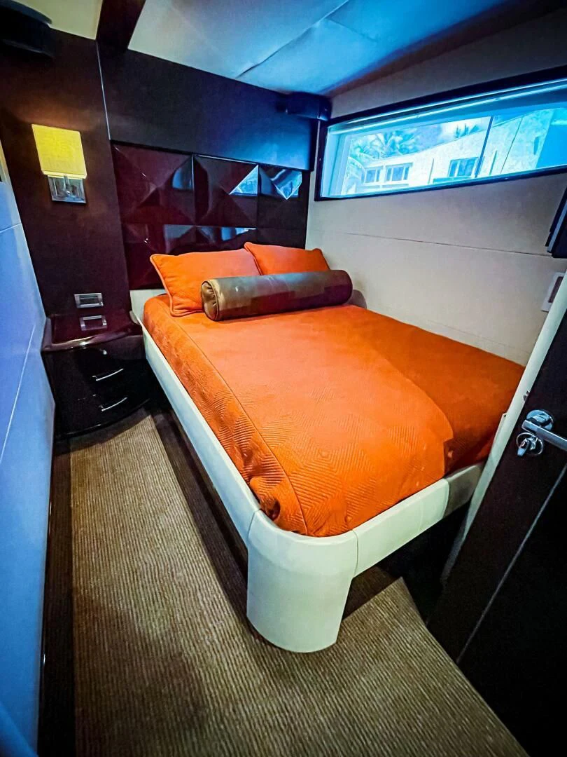 a bed in a room aboard LOVIN LIFE Yacht for Sale