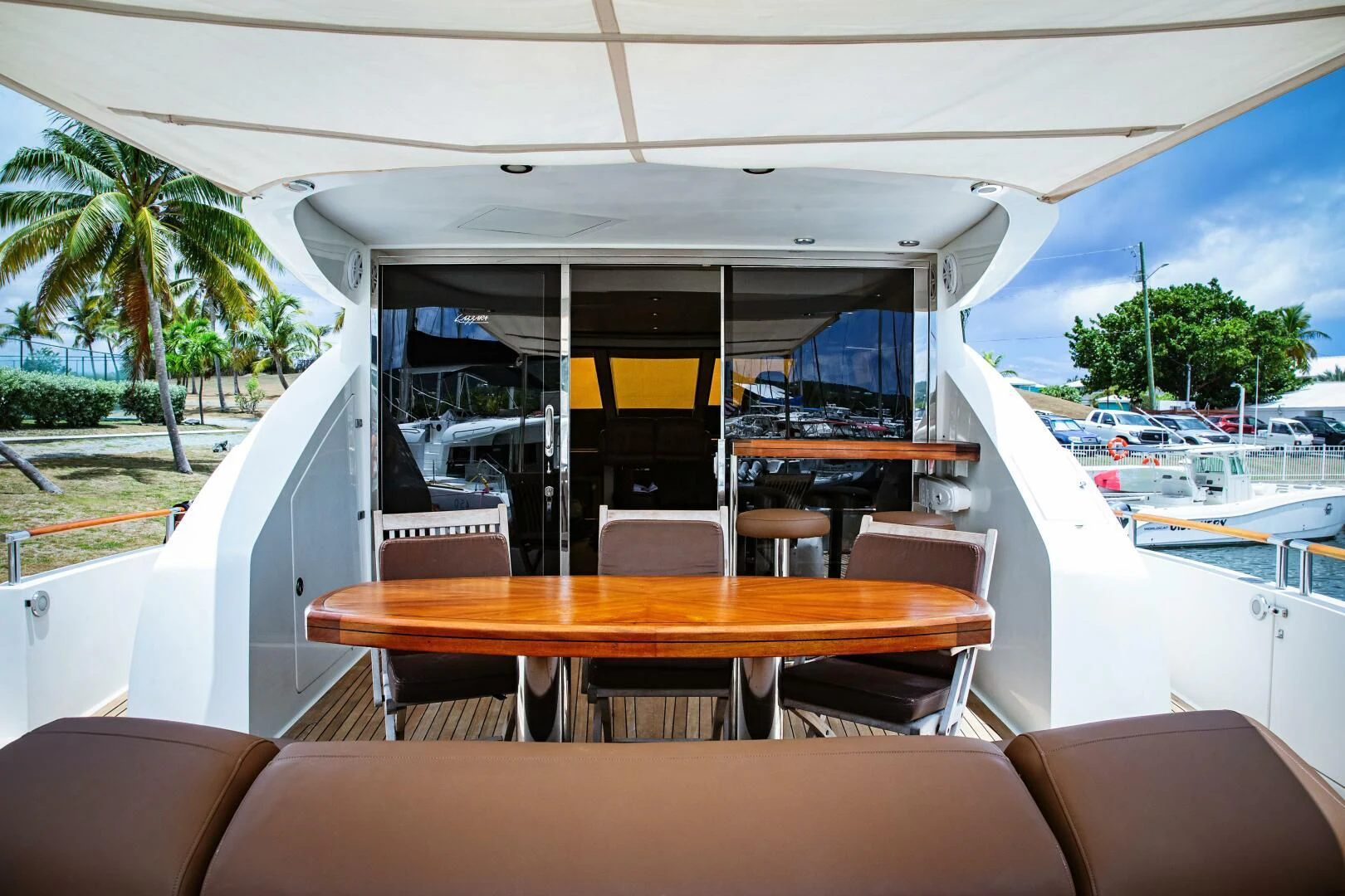 a boat with a table and chairs aboard LOVIN LIFE Yacht for Sale
