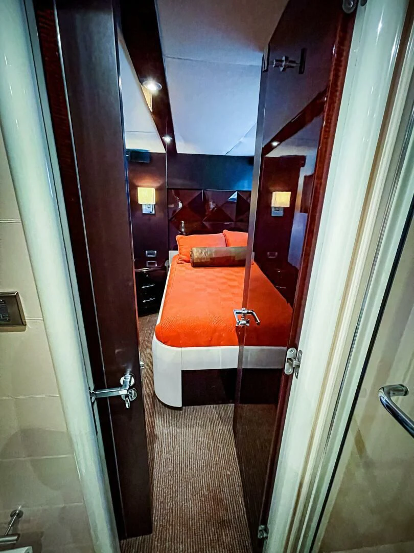 a hallway with a red door aboard LOVIN LIFE Yacht for Sale