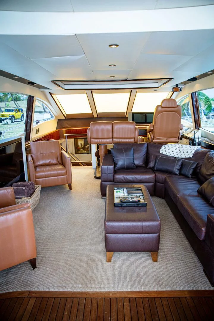 a car with a table and chairs aboard LOVIN LIFE Yacht for Sale
