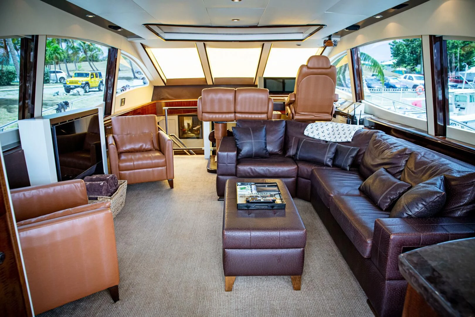 a living room with leather couches aboard LOVIN LIFE Yacht for Sale