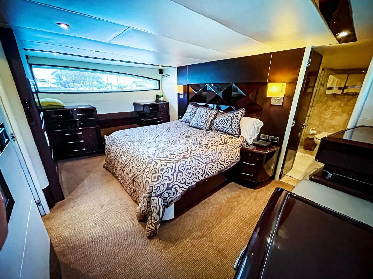 a bedroom with a large bed aboard LOVIN LIFE Yacht for Sale