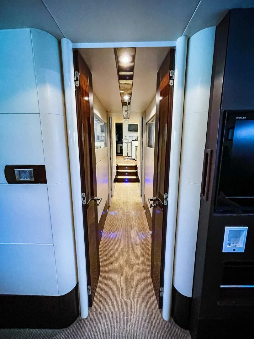 a hallway with doors aboard LOVIN LIFE Yacht for Sale