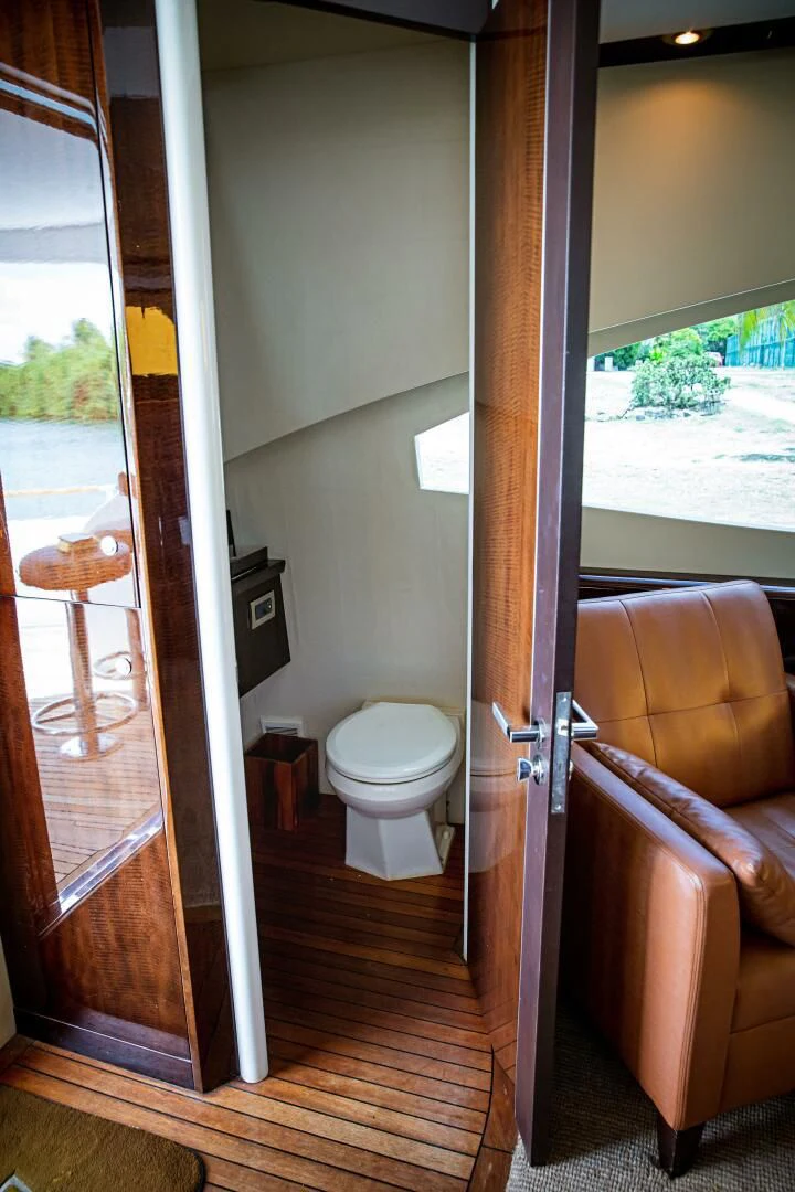 a bathroom with a glass door aboard LOVIN LIFE Yacht for Sale