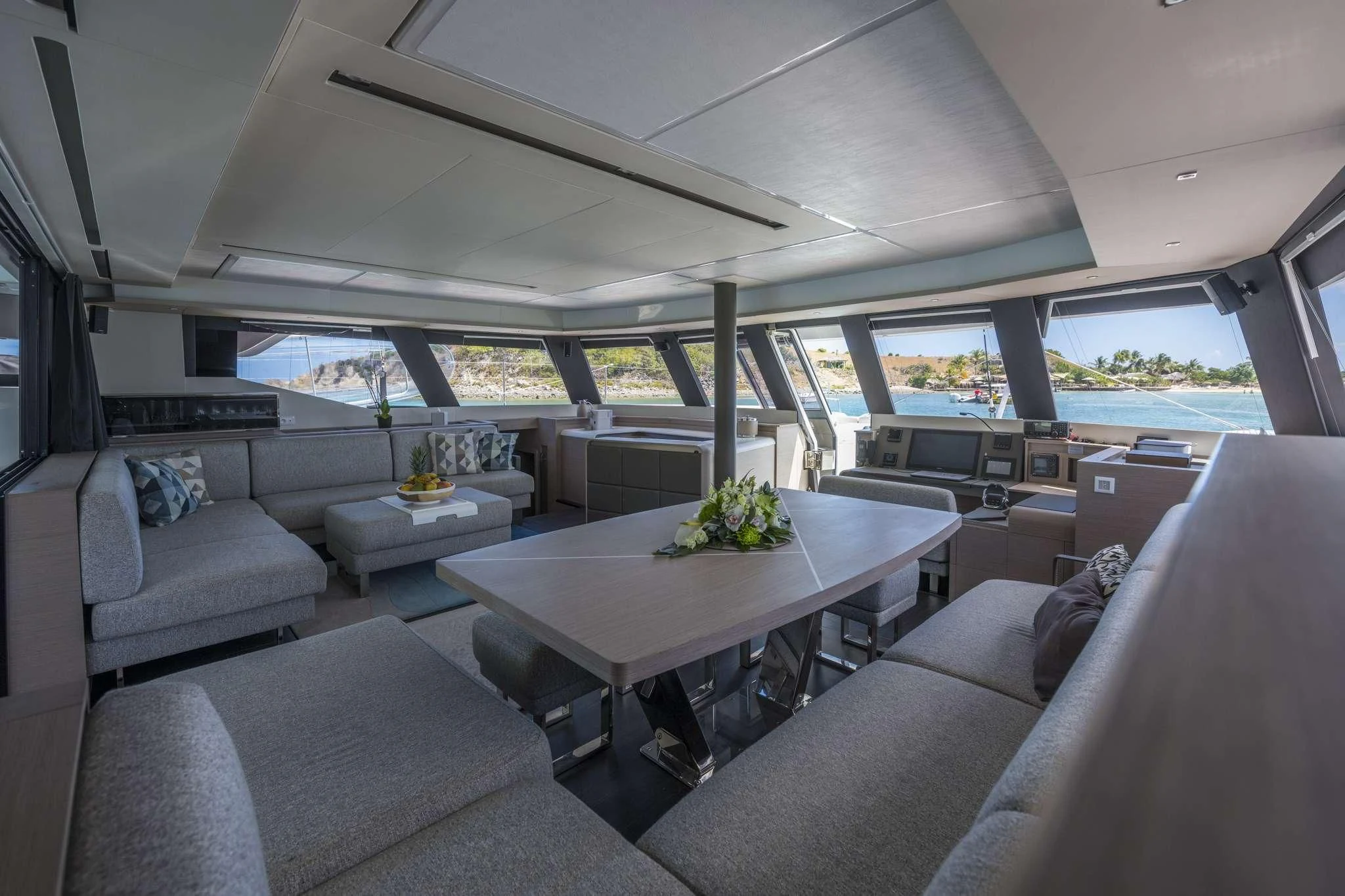 a room with a couch and a table aboard LISA OF THE SEAS Yacht for Sale