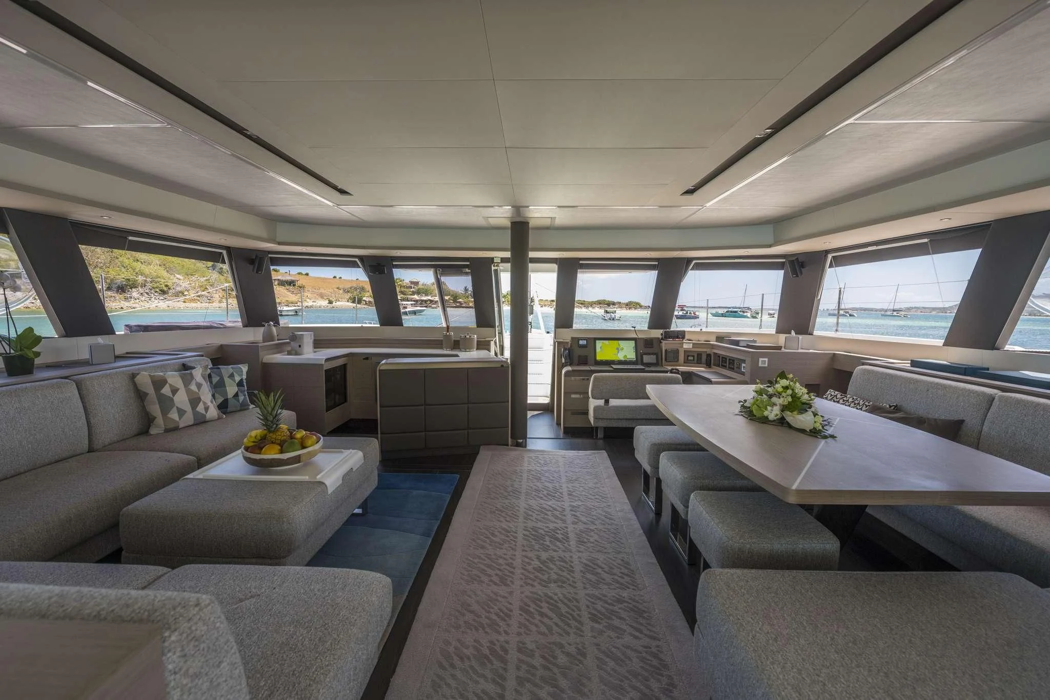 a room with couches and a table aboard LISA OF THE SEAS Yacht for Sale