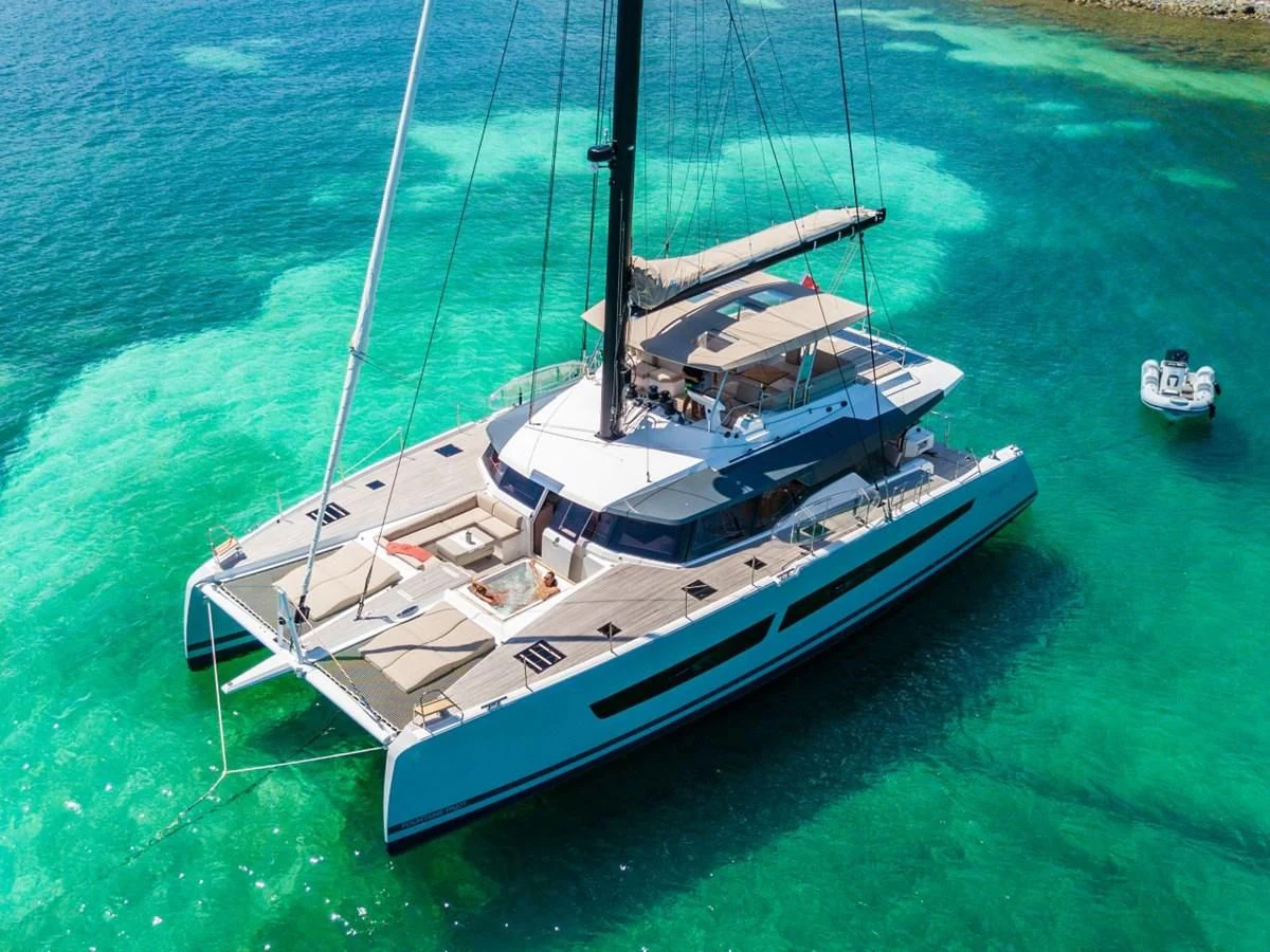 a boat sailing on the water aboard LISA OF THE SEAS Yacht for Sale