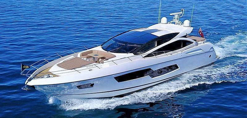 a white yacht on the water aboard LIMITLESS Yacht for Sale