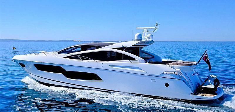 a white yacht on the water aboard LIMITLESS Yacht for Sale