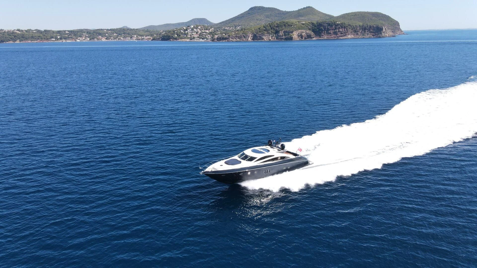 a boat on the water aboard LOW PROFILE Yacht for Sale