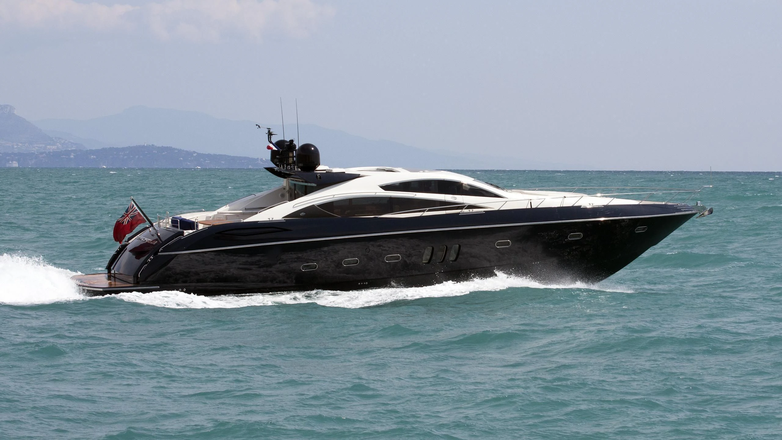 a boat in the water aboard LOW PROFILE Yacht for Sale