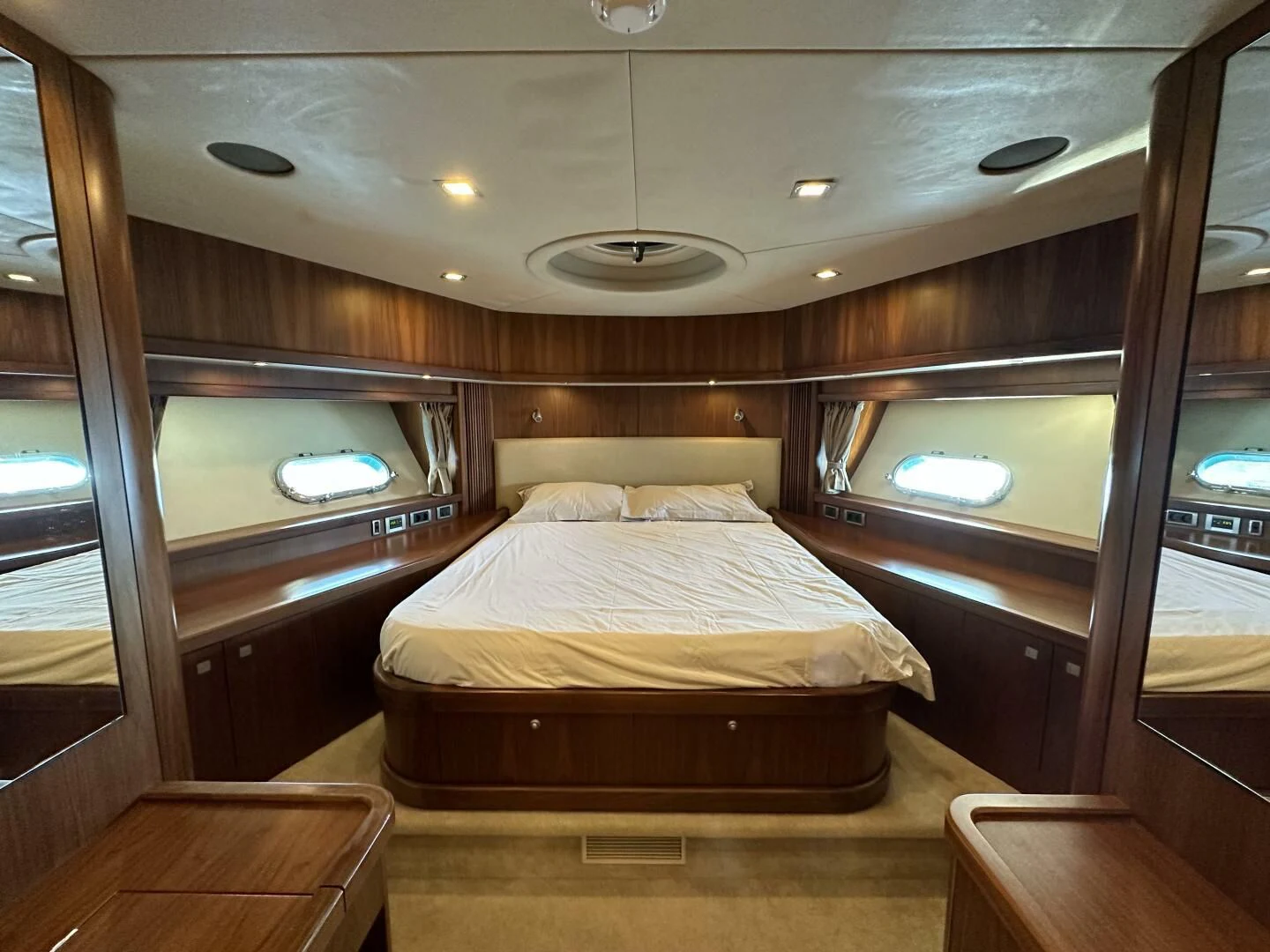 a bedroom with a bed aboard LOW PROFILE Yacht for Sale