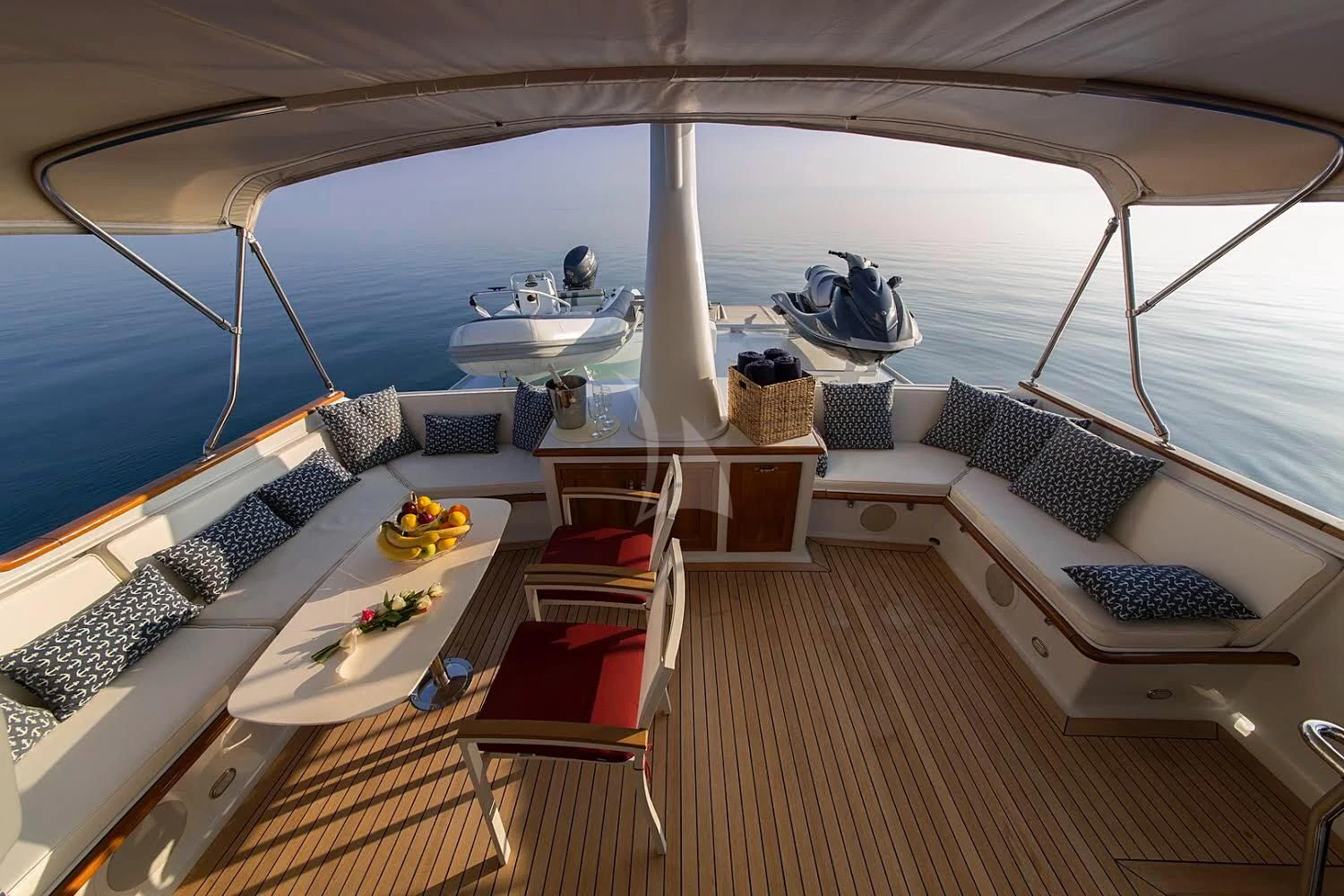 a large living room with a large deck and a large pool aboard ADRIATIC ESCAPE Yacht for Sale