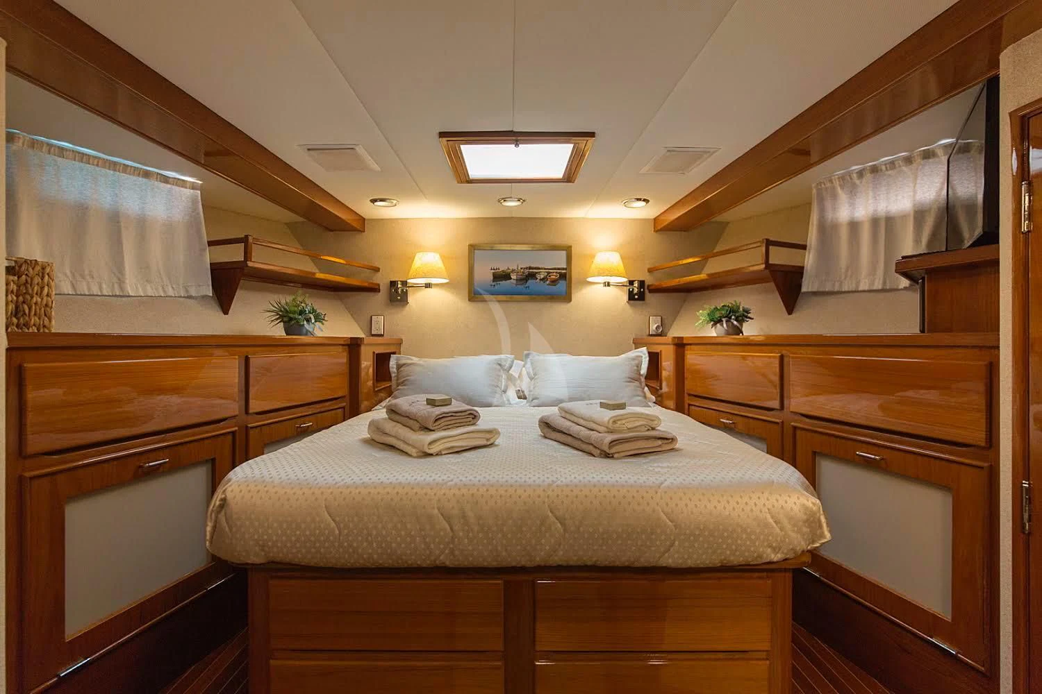 a large bedroom with a bed aboard ADRIATIC ESCAPE Yacht for Sale