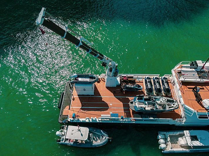 a large ship with a bridge going over it aboard UMBRA Yacht for Sale