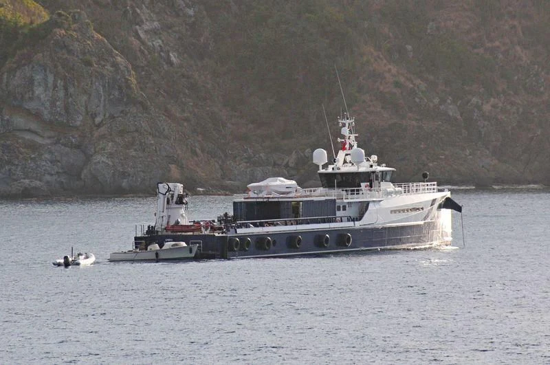 a boat sailing on the water aboard UMBRA Yacht for Sale