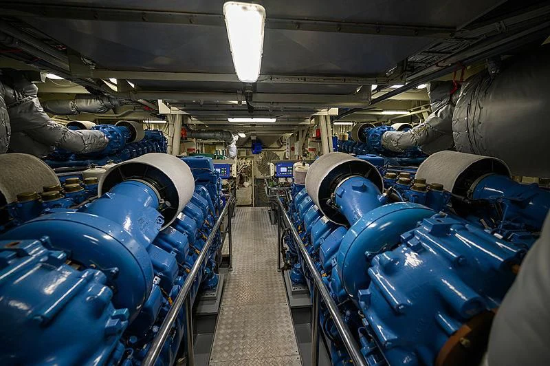 a room full of blue barrels aboard UMBRA Yacht for Sale