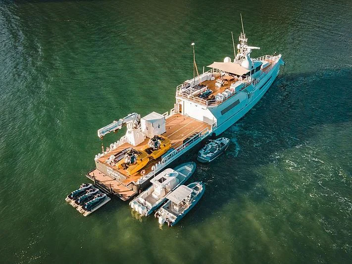 a large ship in the water aboard UMBRA Yacht for Sale