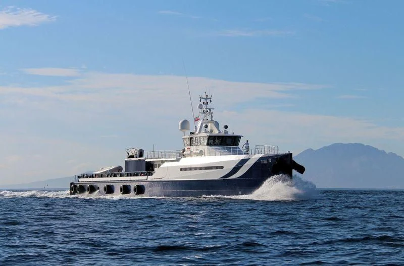 a large ship in the water aboard UMBRA Yacht for Sale