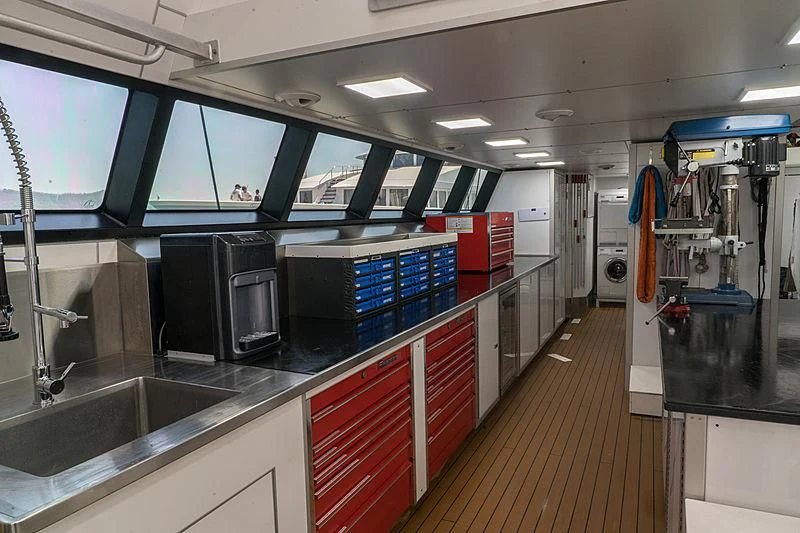 a large kitchen with several appliances aboard UMBRA Yacht for Sale