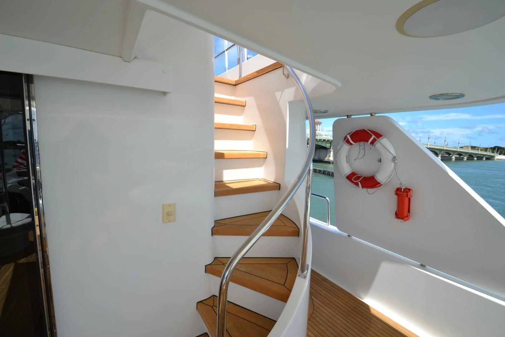 a white and red staircase on a boat aboard INTUITION Yacht for Sale