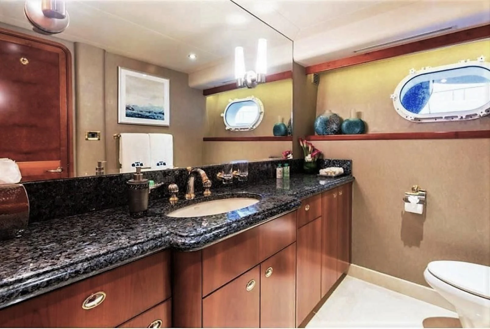 a bathroom with a marble counter top aboard INTUITION Yacht for Sale