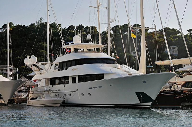 a large white boat in the water aboard INTUITION Yacht for Sale