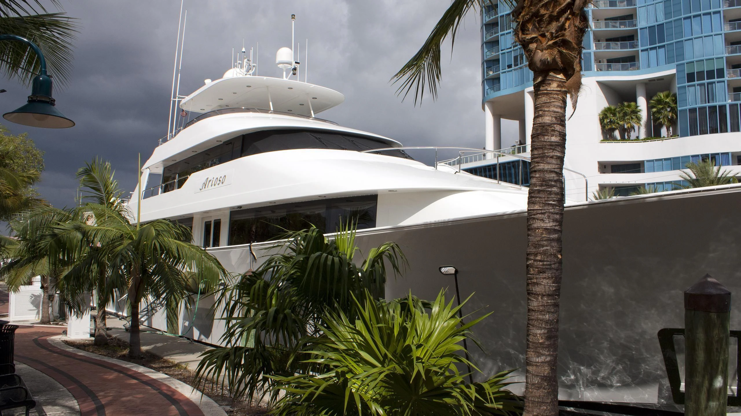 a white building with a white boat aboard INTUITION Yacht for Sale