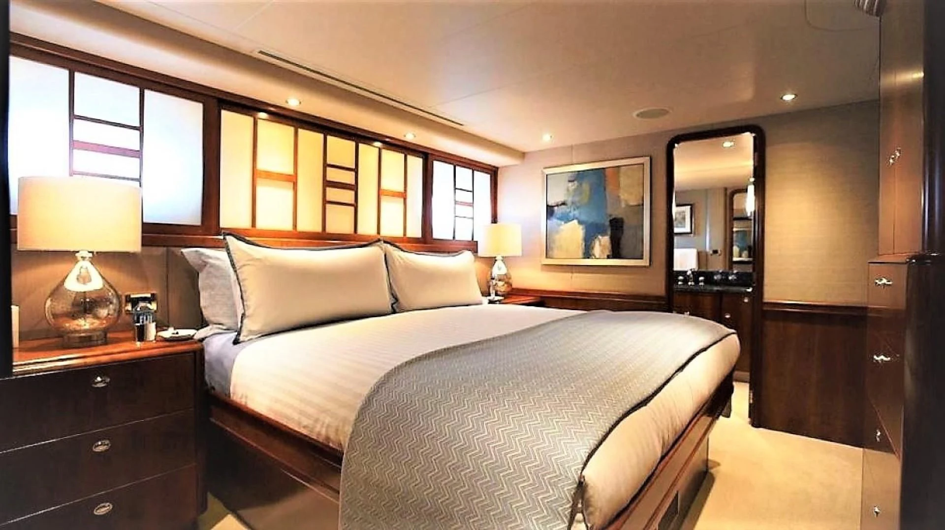 a hotel room with a bed aboard INTUITION Yacht for Sale