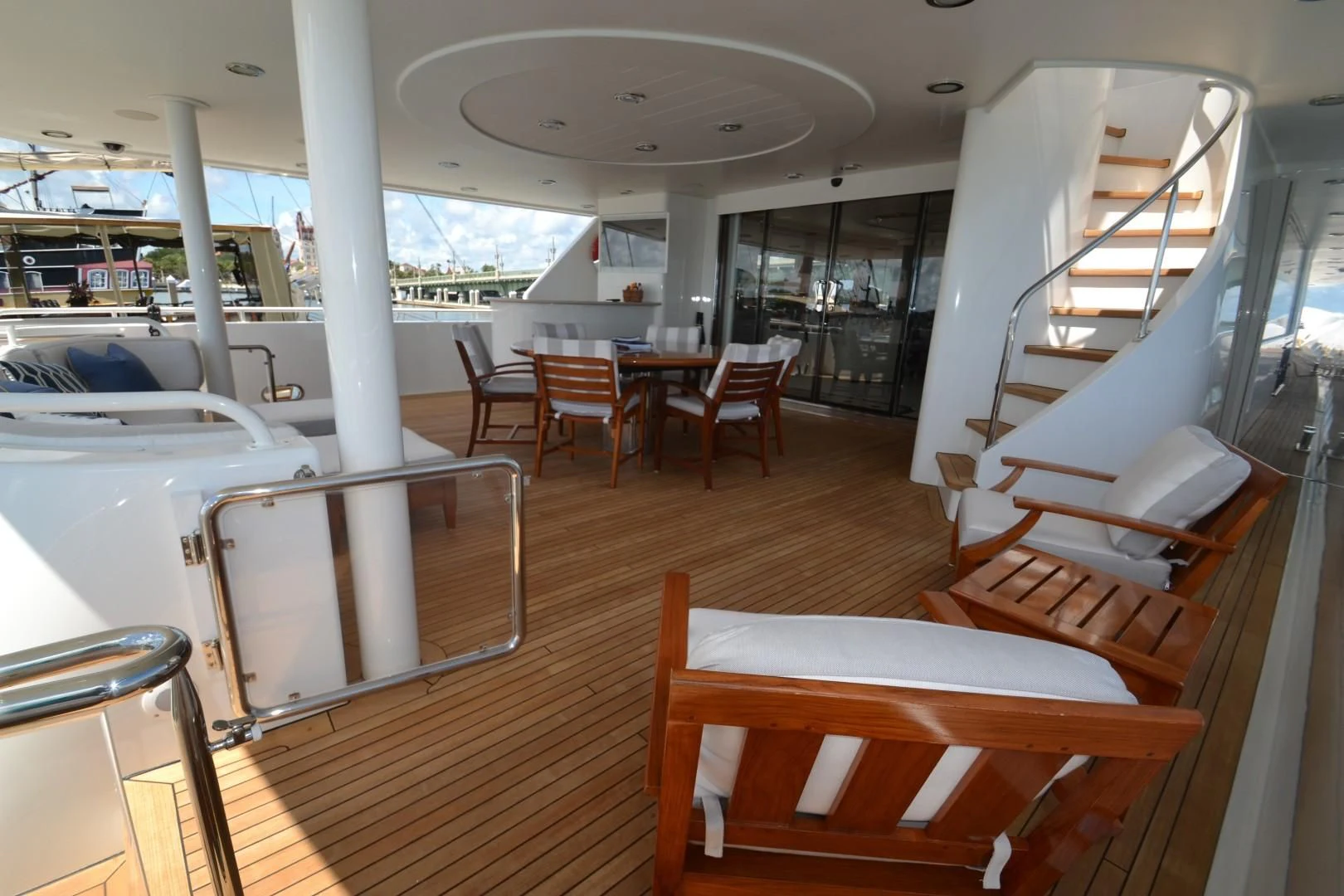 a boat with tables and chairs aboard INTUITION Yacht for Sale