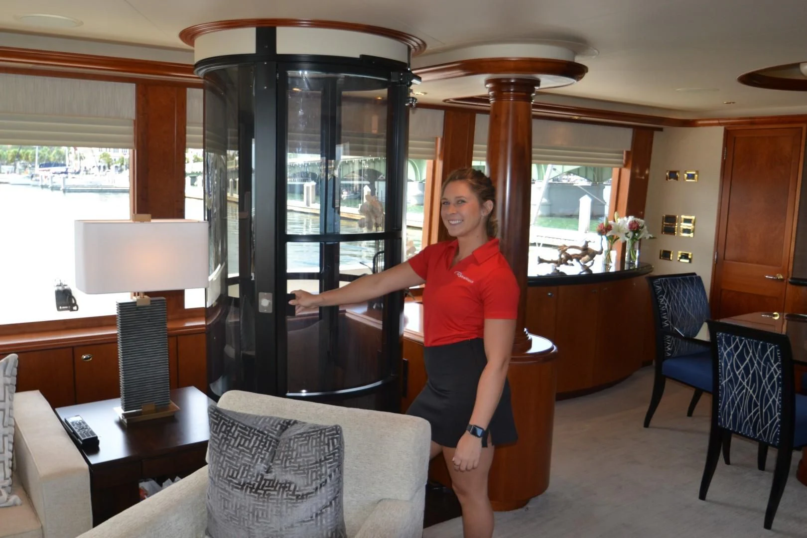 a person standing in a living room aboard INTUITION Yacht for Sale