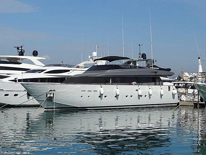 a white yacht in the water aboard CORAL Yacht for Sale