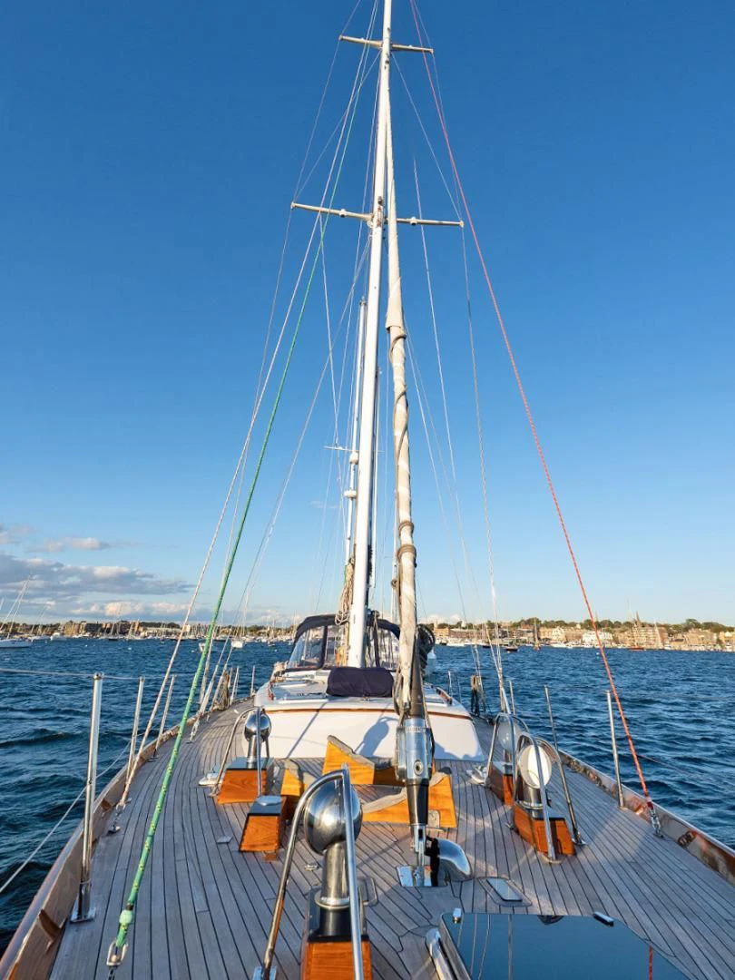 a sailboat on a dock aboard HERMIE LOUISE Yacht for Sale