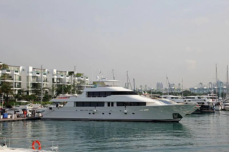 a white yacht in a harbor aboard SEA BEAR Yacht for Sale
