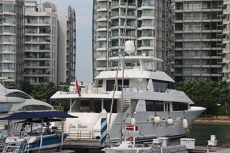 a boat docked in front of a building aboard SEA BEAR Yacht for Sale