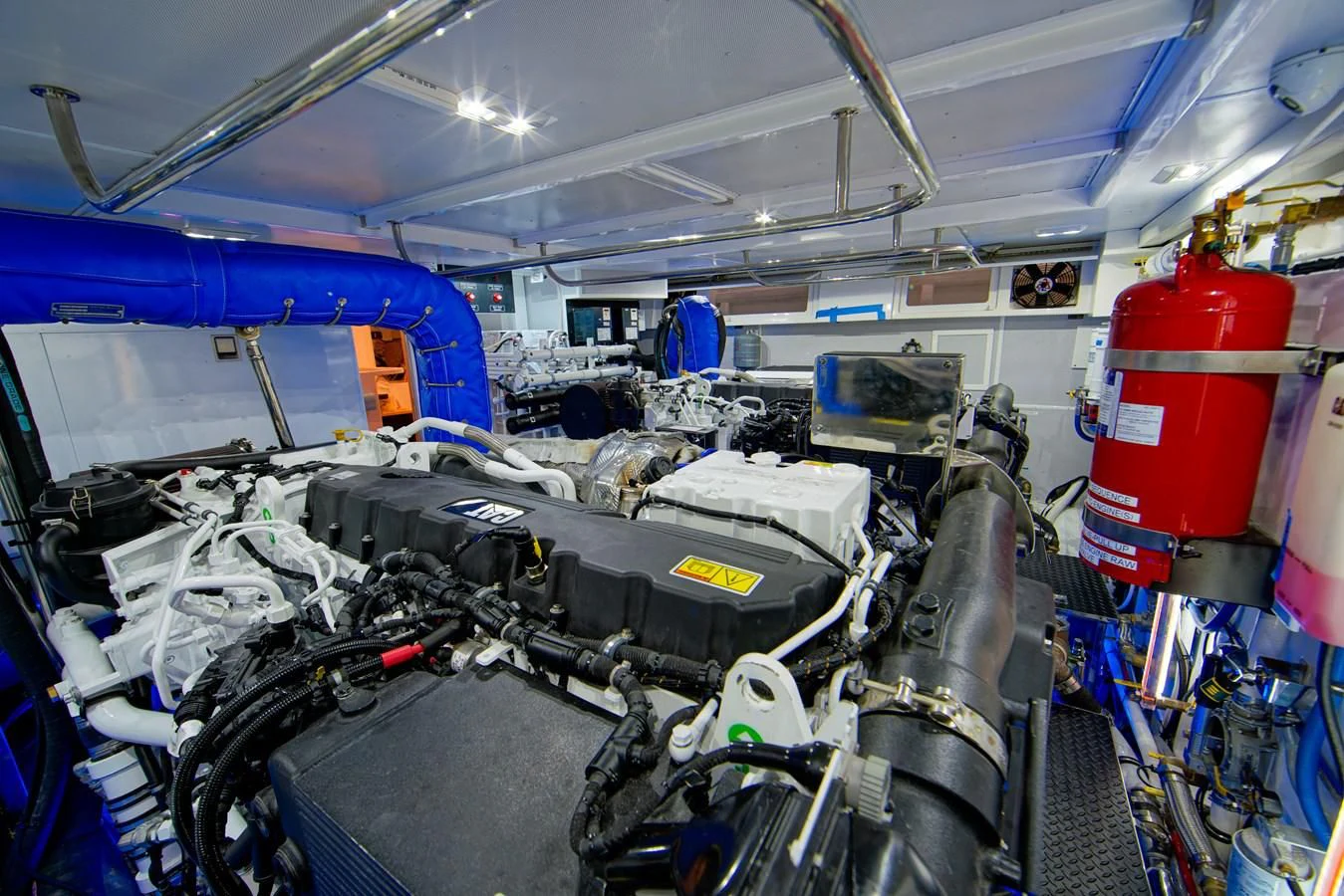 a large room full of vehicles aboard KING OF NOTHING Yacht for Sale