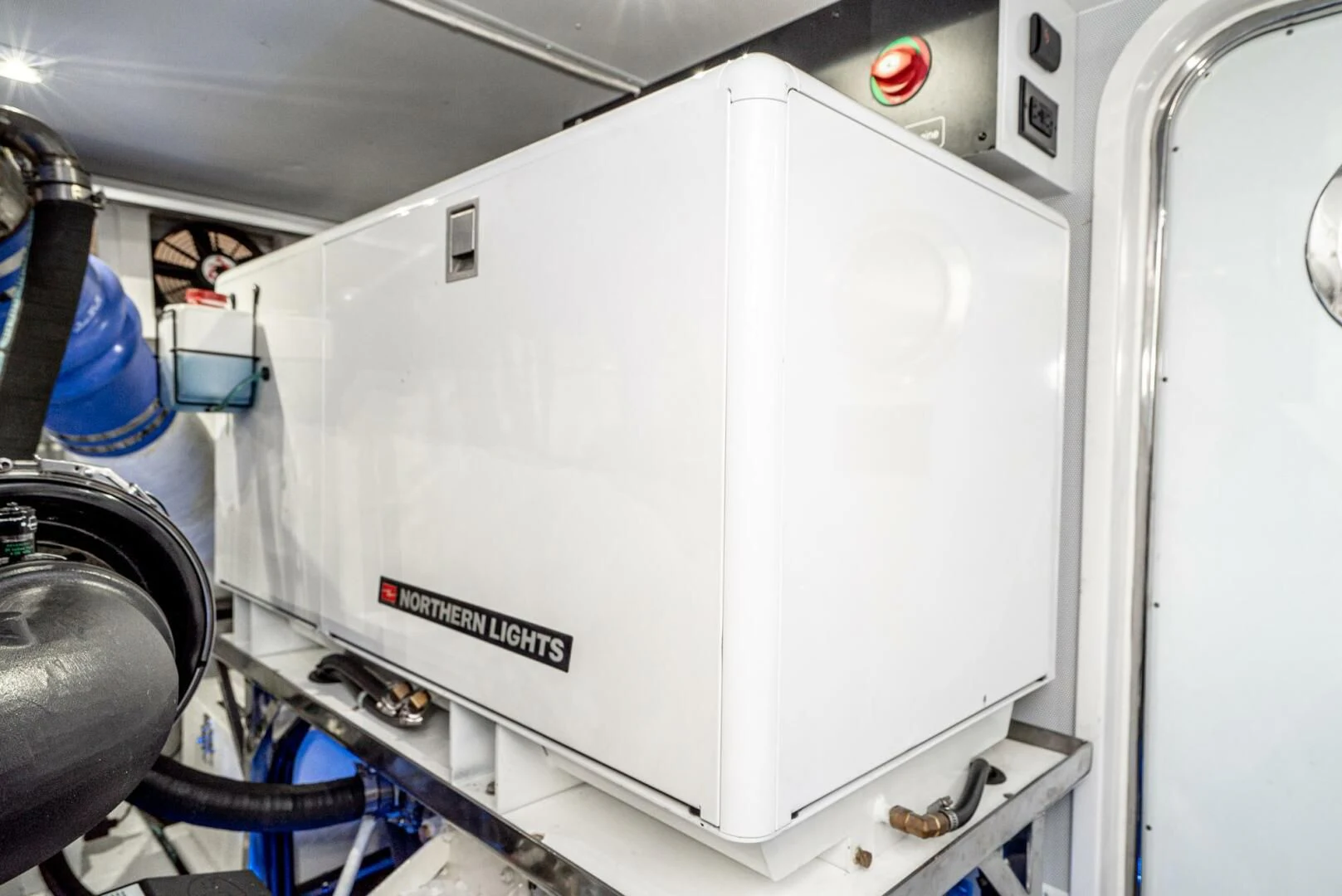 a white machine with a red light aboard KING OF NOTHING Yacht for Sale