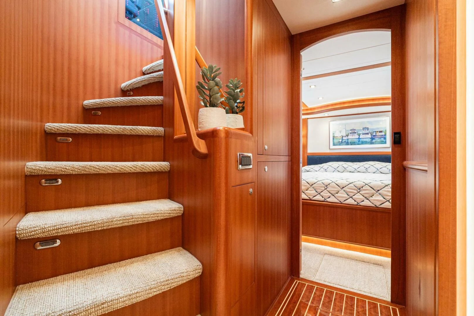 a wooden staircase in a house aboard KING OF NOTHING Yacht for Sale