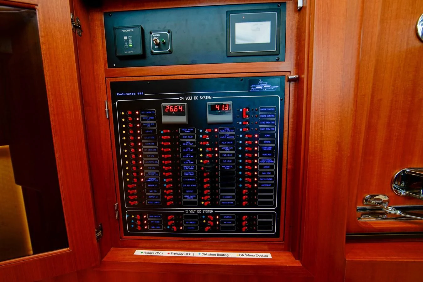 a computer on a desk aboard KING OF NOTHING Yacht for Sale