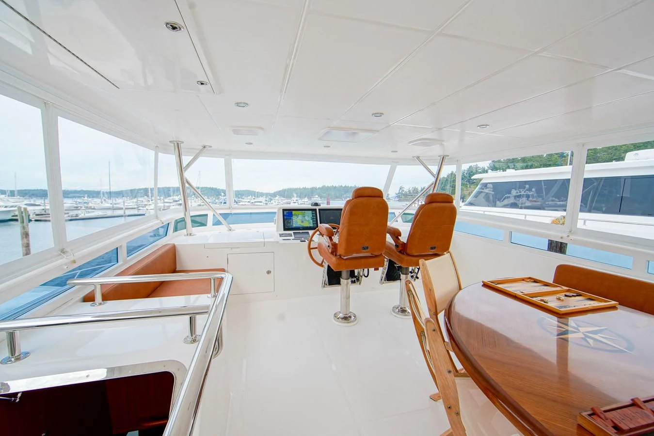 a boat with a view of the water and the deck aboard KING OF NOTHING Yacht for Sale