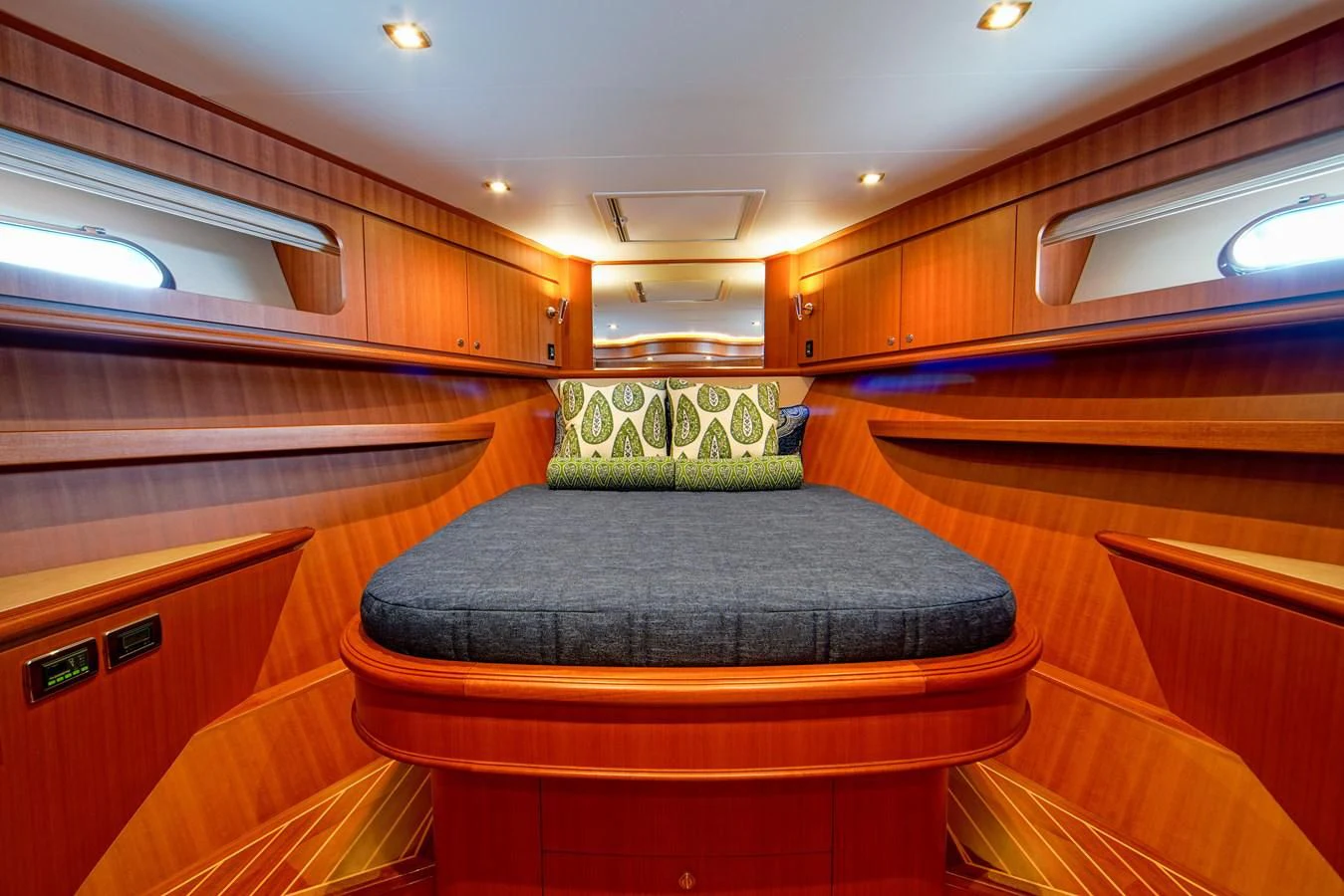 a room with a bed and a desk aboard KING OF NOTHING Yacht for Sale