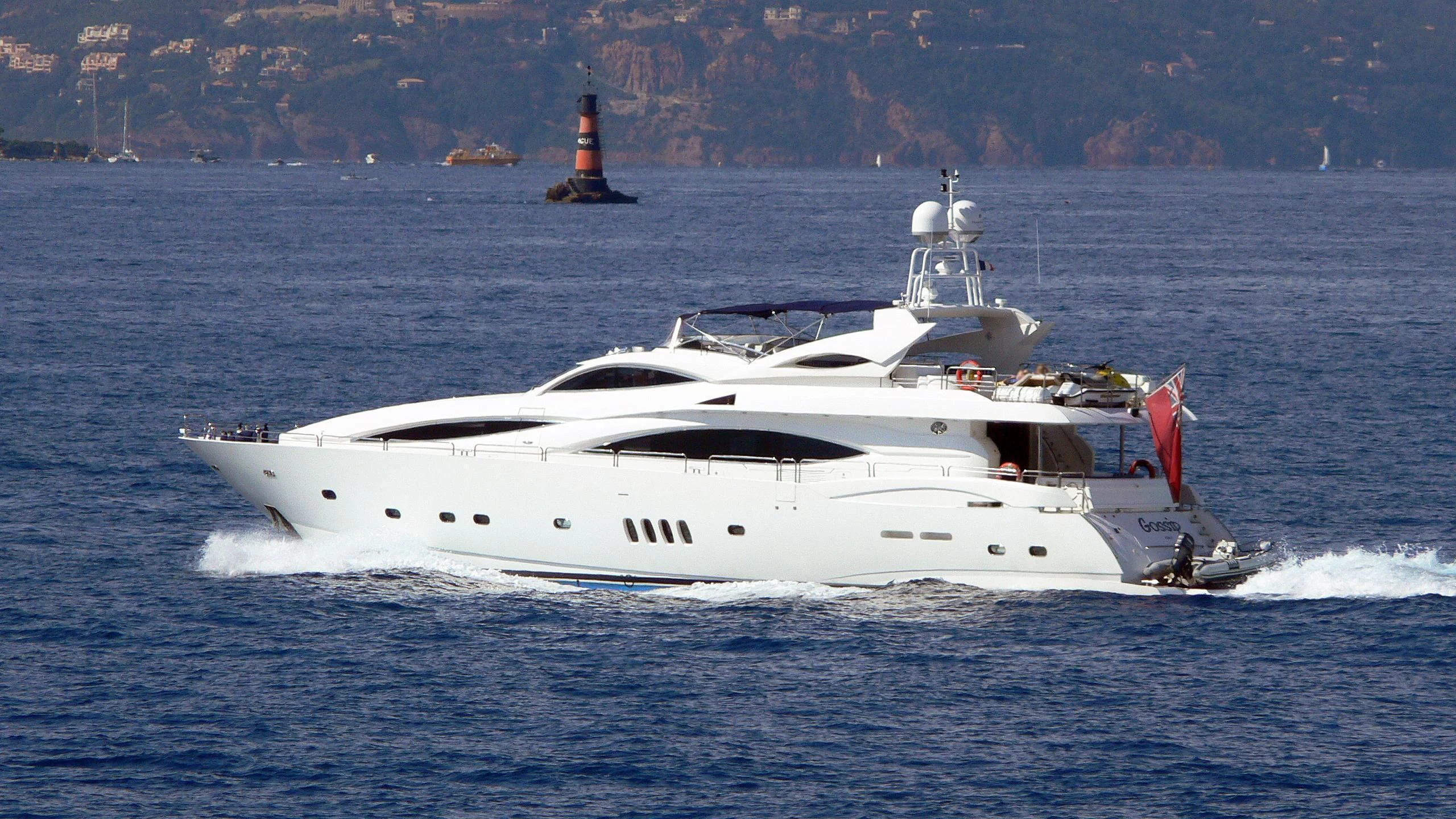 a white yacht in the water aboard #OMG Yacht for Sale