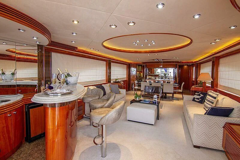 a living room with a large open floor plan aboard #OMG Yacht for Sale