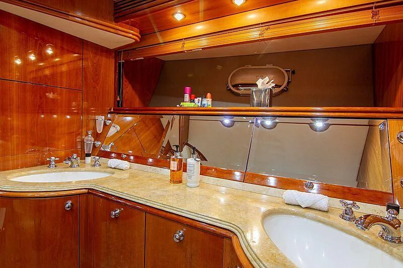 a bathroom with two sinks aboard #OMG Yacht for Sale