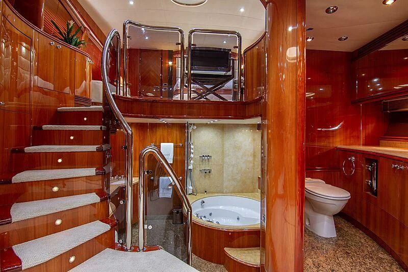 a bathroom with a glass shower aboard #OMG Yacht for Sale