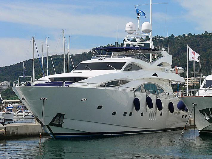 a large white boat aboard #OMG Yacht for Sale